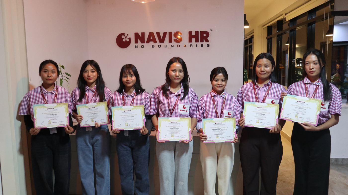 Candidates from a recent NAVIS HR batch holding their Japanese language training achievement certificates