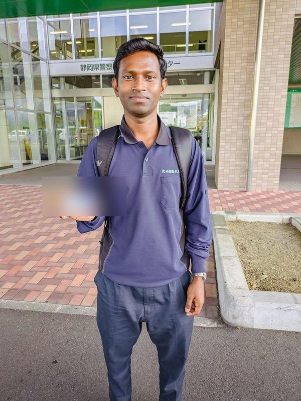Munda Masidas holding his Japanese large-vehicle licence